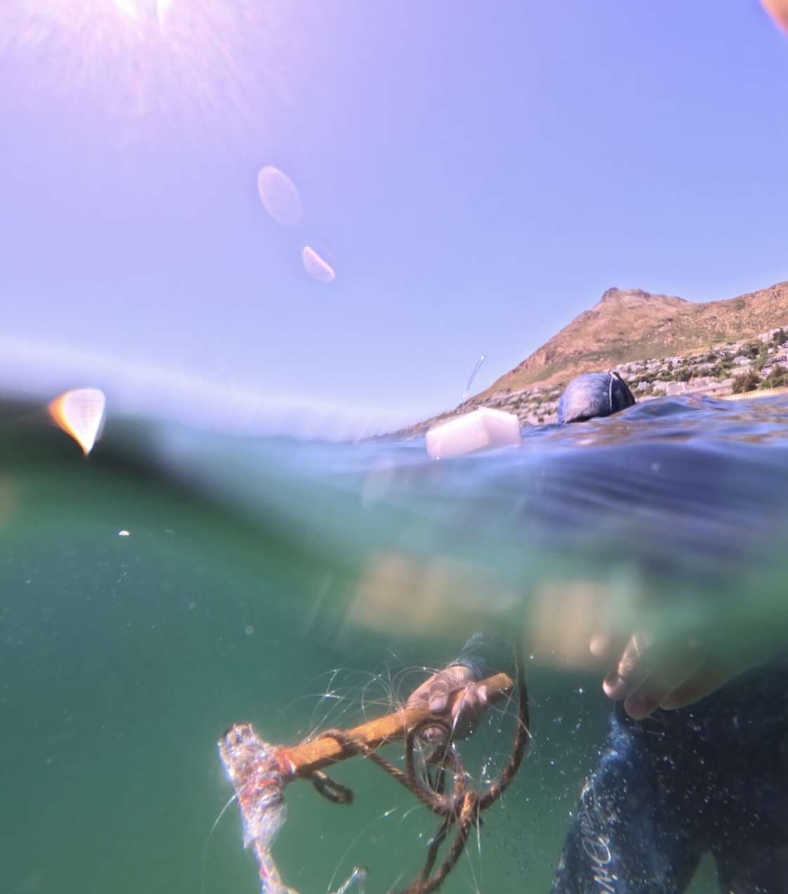 Freediver in deep blue water